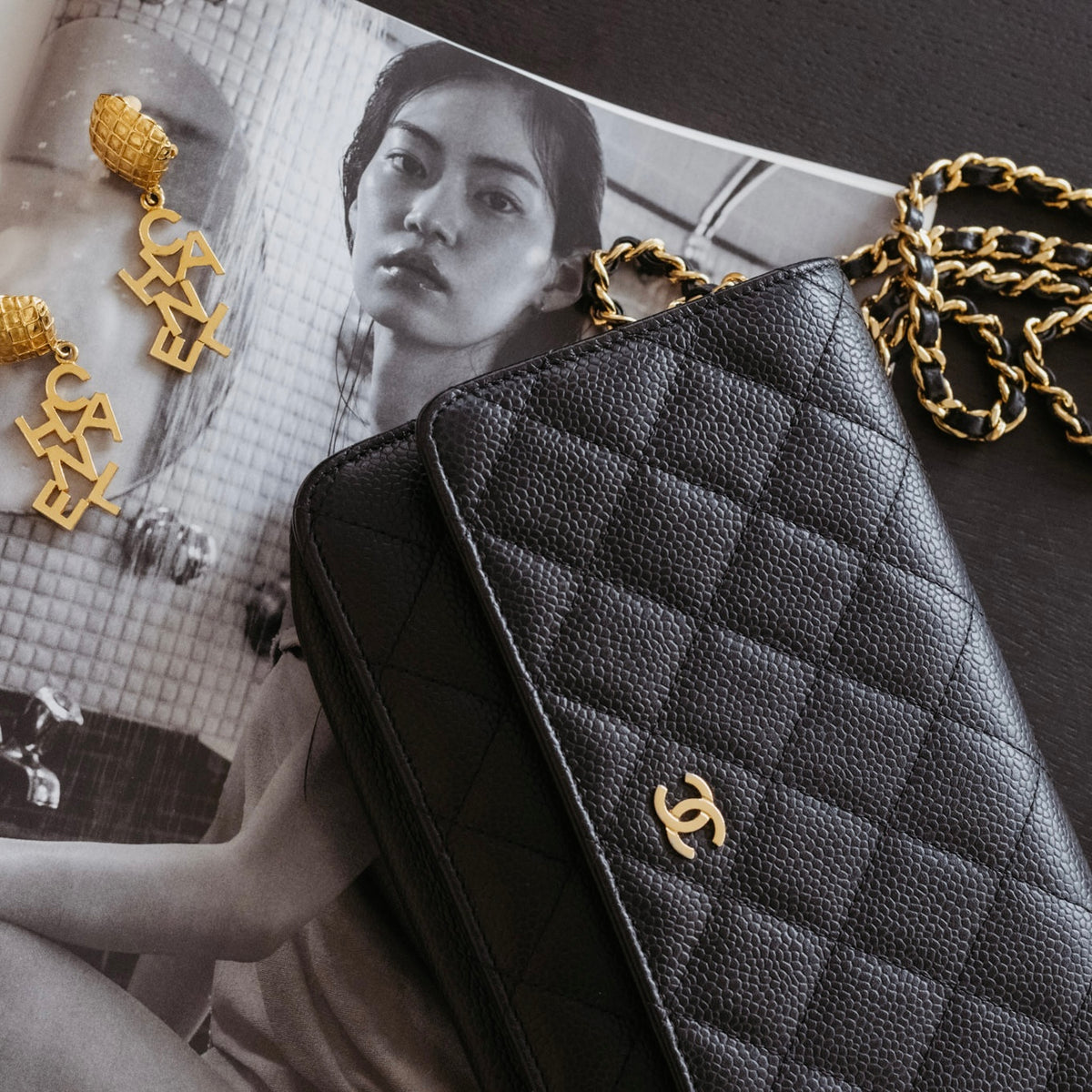 Authentic pre-owned Chanel wallet on chain black caviar leather gold hardware