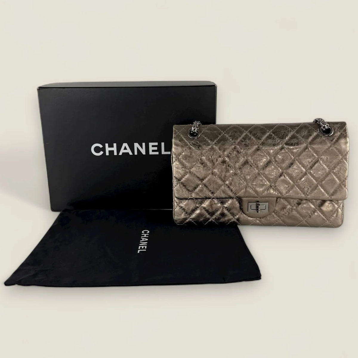 Chanel Reissue 226 metallic bronze with dustbag & box