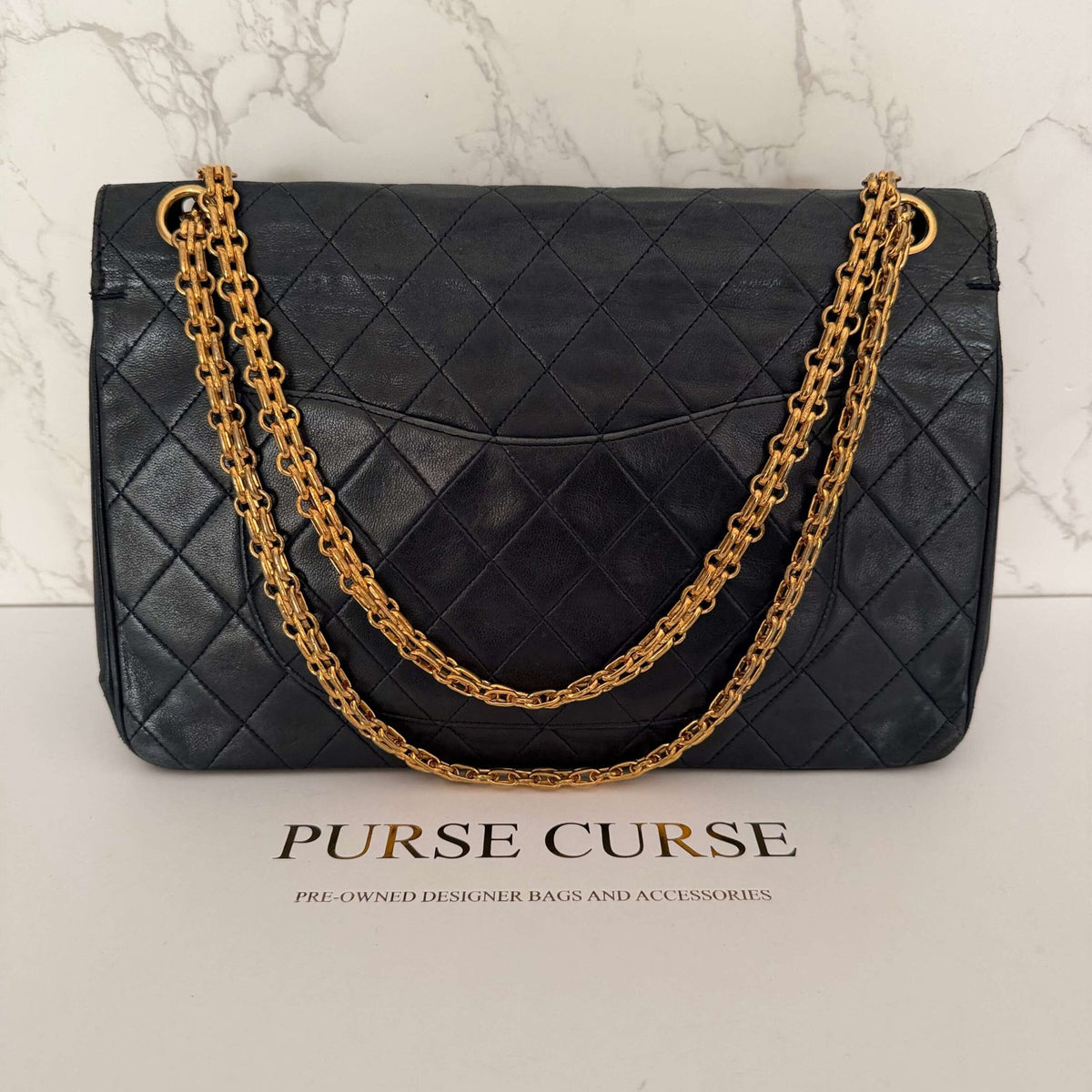 Chanel double flap medium black lambskin back