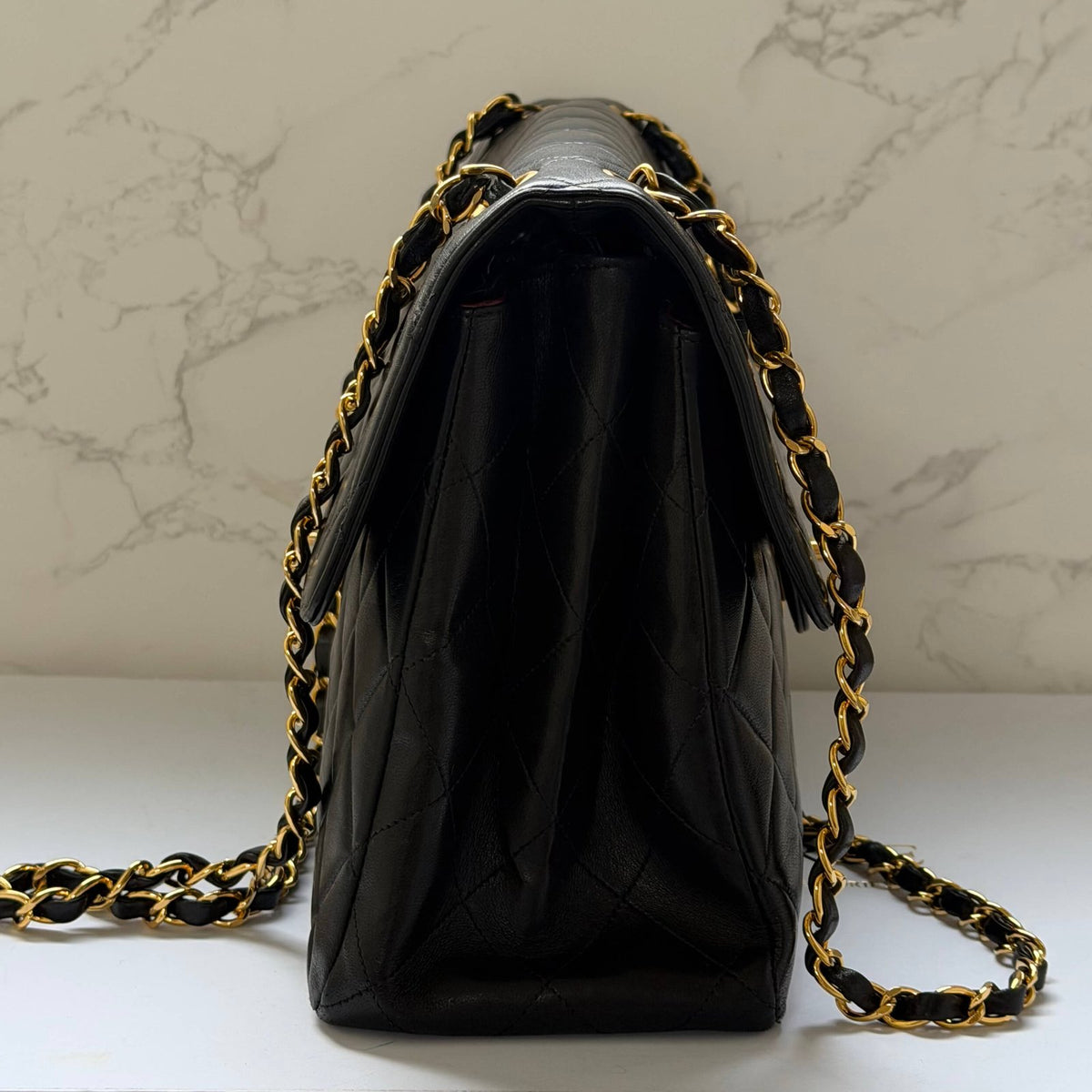Chanel jumbo flap bag black front CC closure