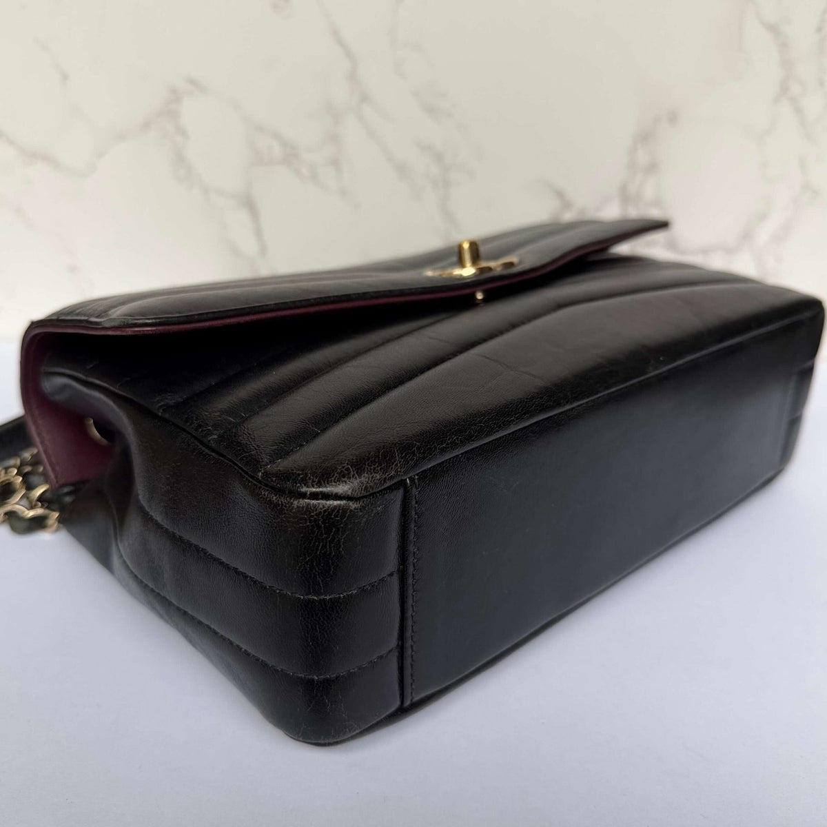 Chanel reversed chevron flap bag detail