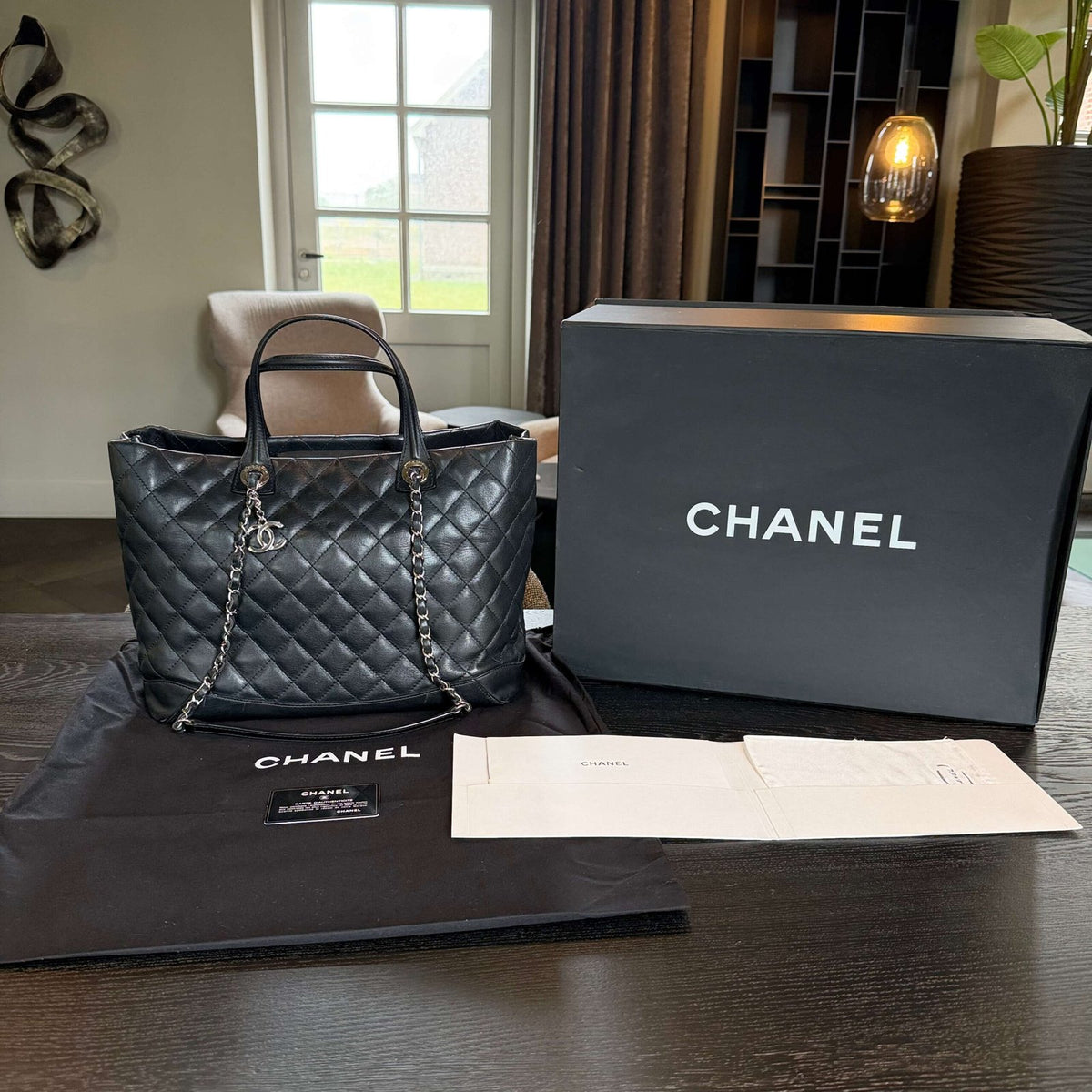 Large Chanel shopping bag with original box, dustbag, authenticity card, and care cloth