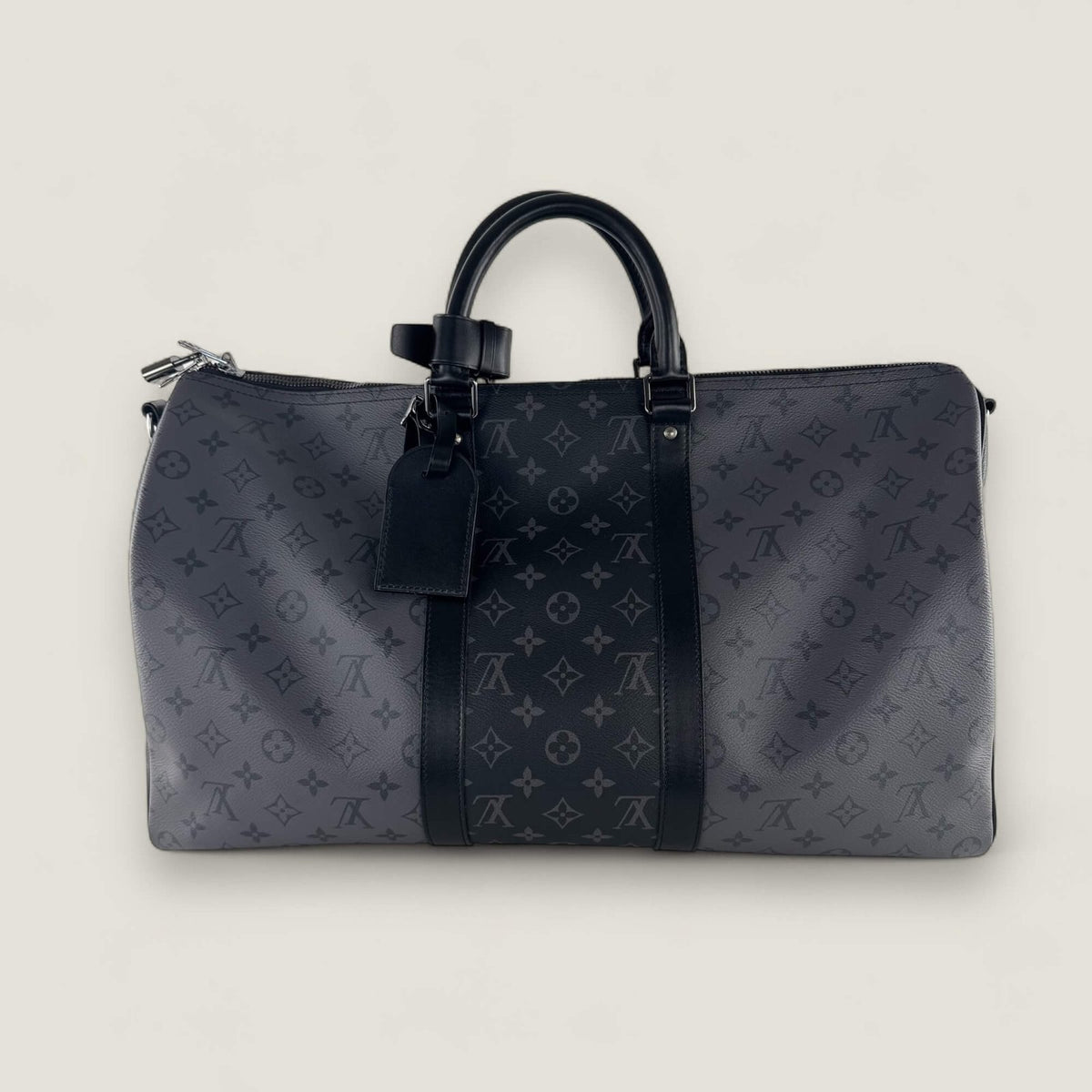 Louis Vuitton Keepall Bandoulière 50 front in grey monogram canvas