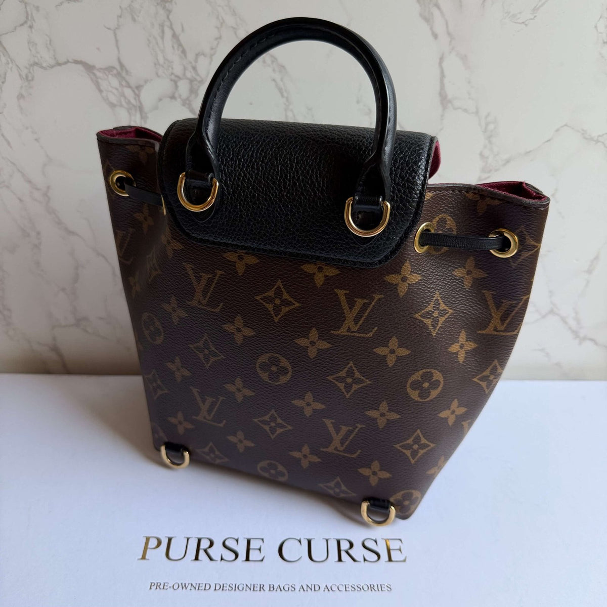 Louis Vuitton Montsouris BB designer rugzak tweedehands