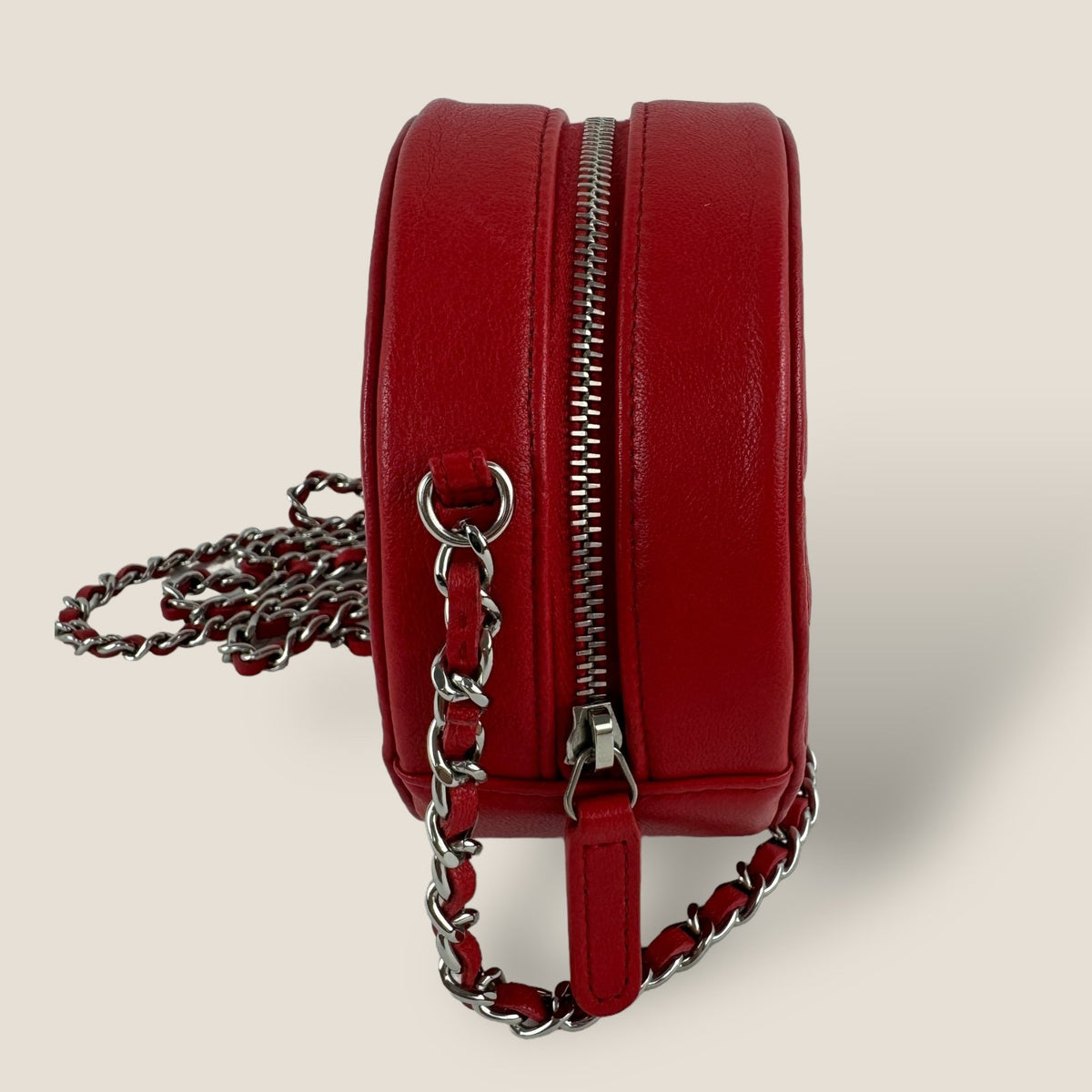 Preowned Chanel round crossbody small bag red leather camellia
