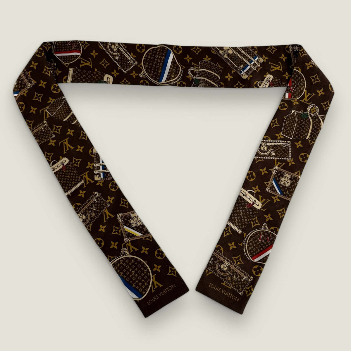 Tweedehands Louis Vuitton sjaaltje twilly monogram tassen en koffers