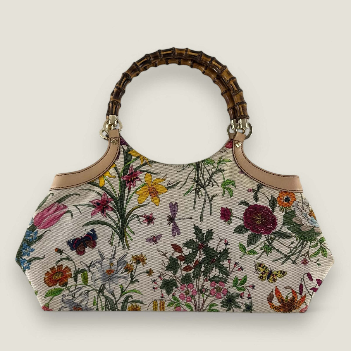 Tweedehands designer Gucci Bamboo bloemenprint handtas.