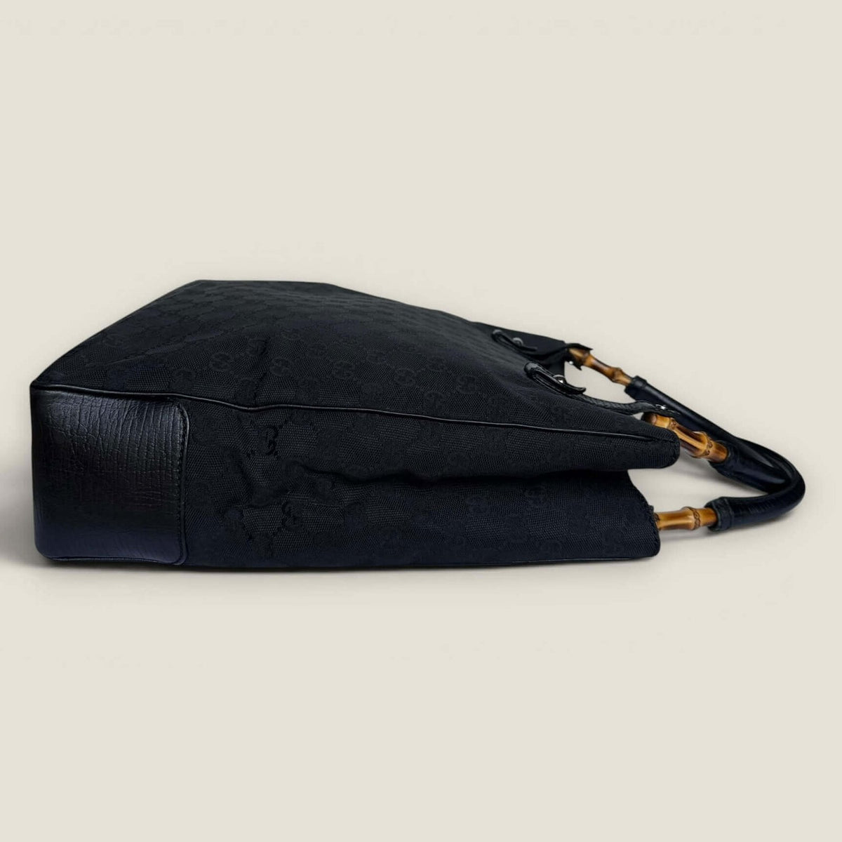 Zijkant vintage Gucci tote zwart