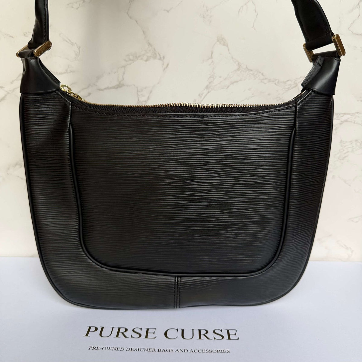 Achterkant authentieke Louis Vuitton epi leer
