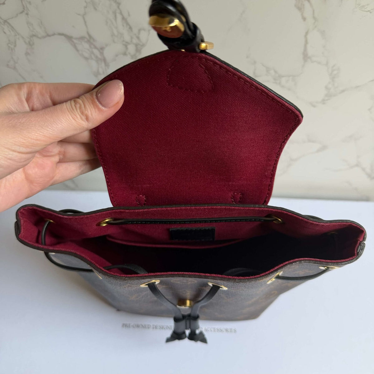 Binnenkant Louis Vuitton Montsouris BB rugzak monogram