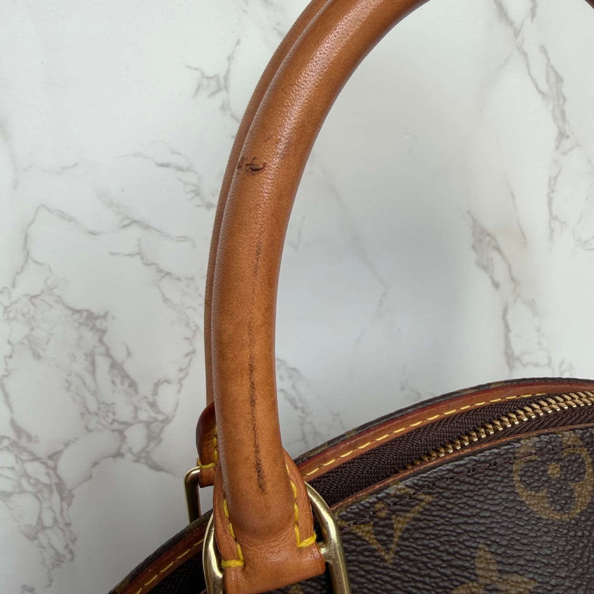 Detail handvat authentieke Louis Vuitton tas