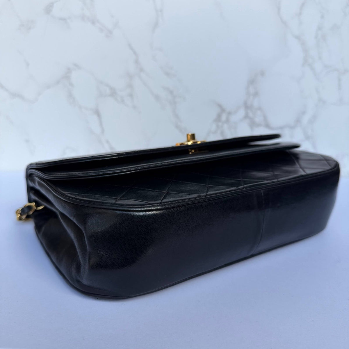 Signs of wear on authentic Chanel shoulder bag from the 1980s
