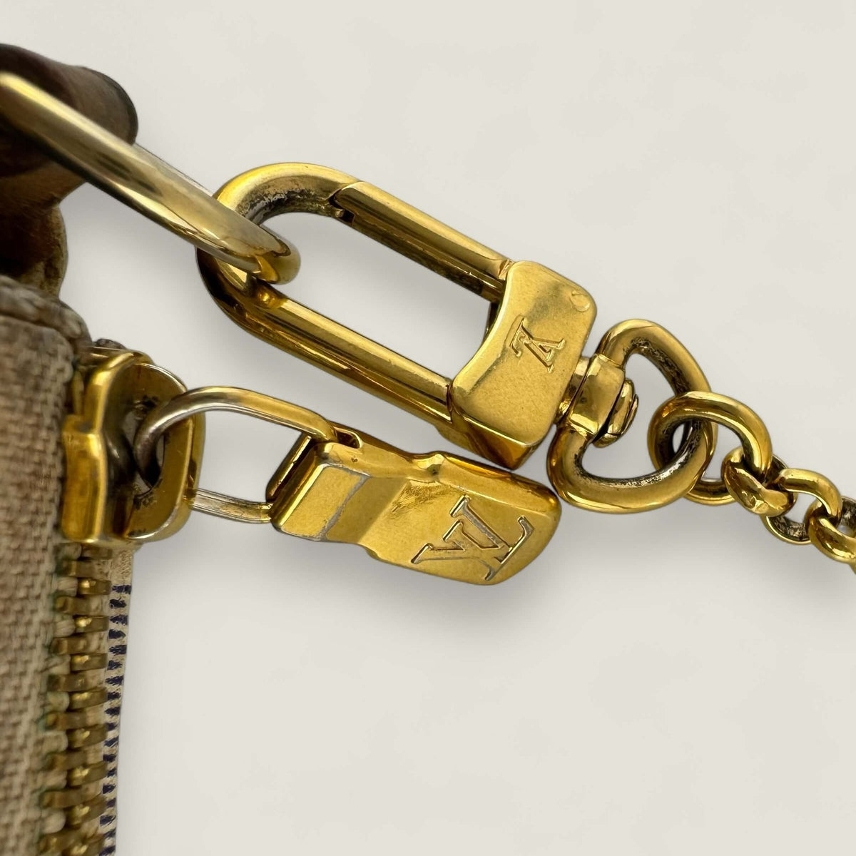 Hardware gold Louis Vuitton clutch 2014