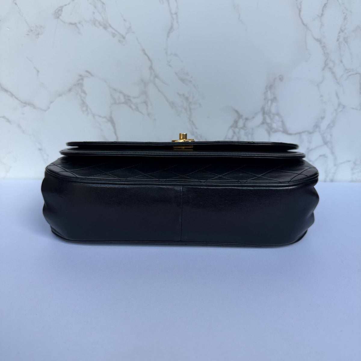Bottom of authentic Chanel shoulder bag from the early 1980s