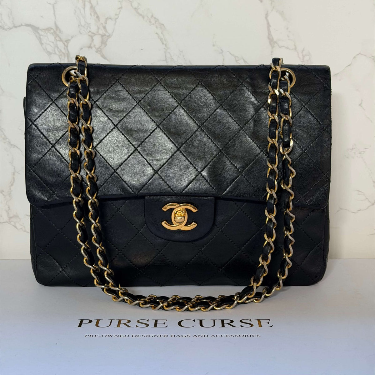 Pre-owned Chanel flap bag in black lambskin