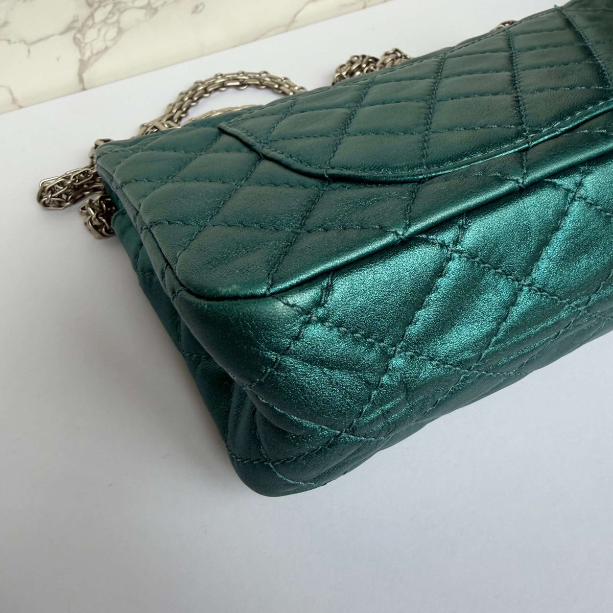 Tweedehands Chanel schoudertas reissue hoekjes