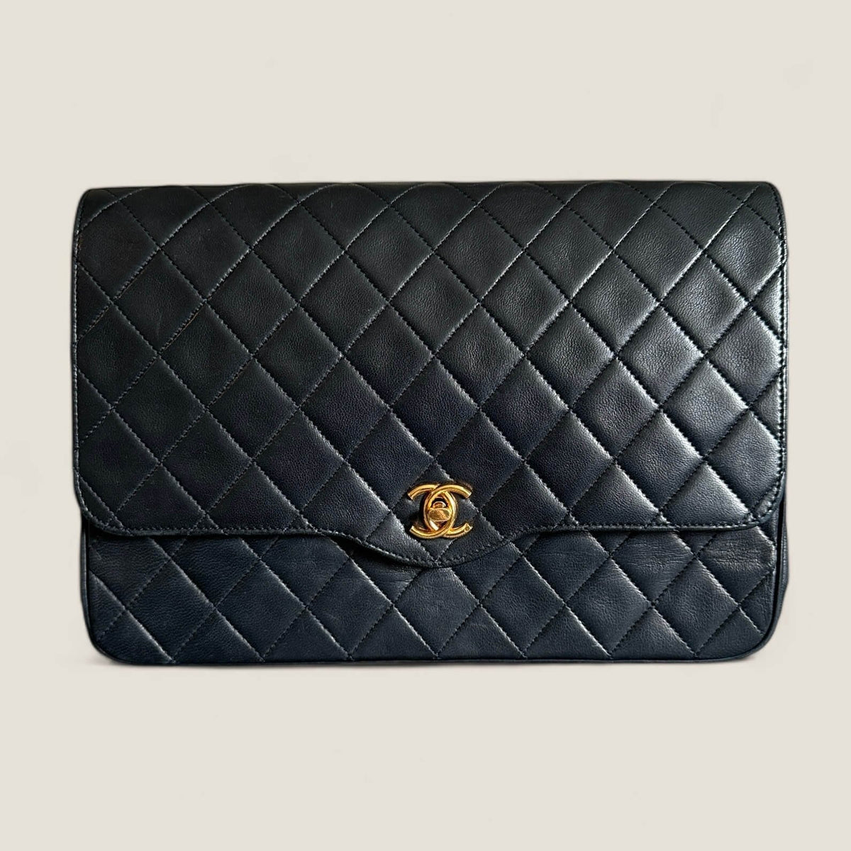 Pre-owned designer bag Chanel gold hardware lambskin dark blue